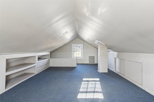 53 S Grove St S, Valley Stream, NY 11580 - additional living space with lofted ceiling, ornate columns, and dark colored carpet