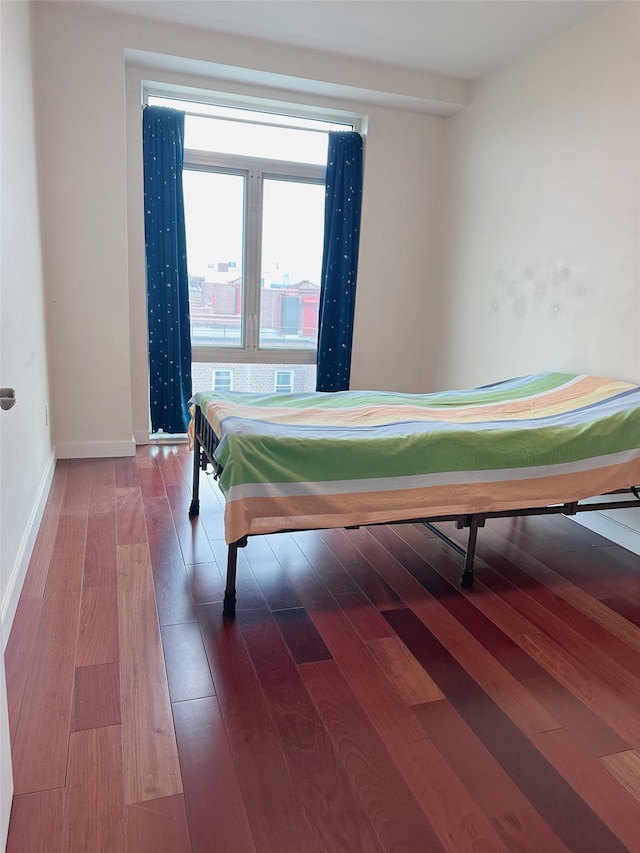 bedroom featuring wood-type flooring