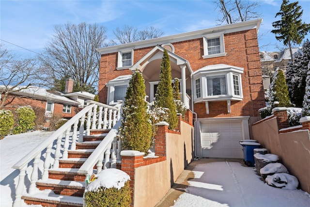 view of front of property featuring a garage