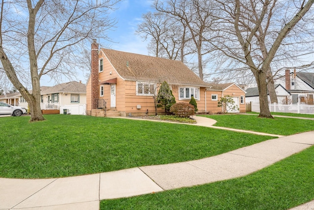 view of front of house featuring a front lawn