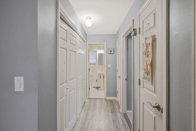 hall featuring light hardwood / wood-style floors