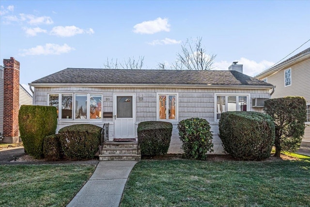 view of front of home with a front yard