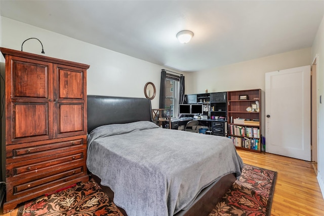 bedroom featuring light hardwood / wood-style floors