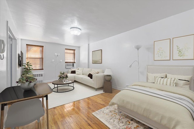 bedroom featuring light hardwood / wood-style floors