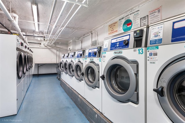 laundry area with washing machine and clothes dryer