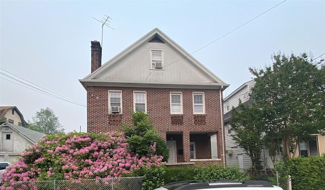 view of front of property featuring cooling unit