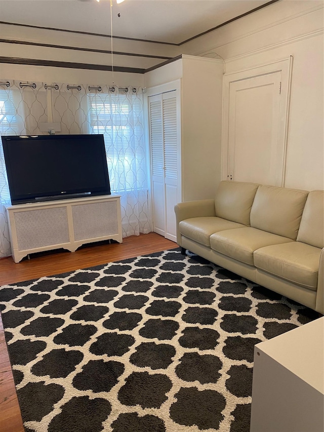 unfurnished living room featuring hardwood / wood-style floors