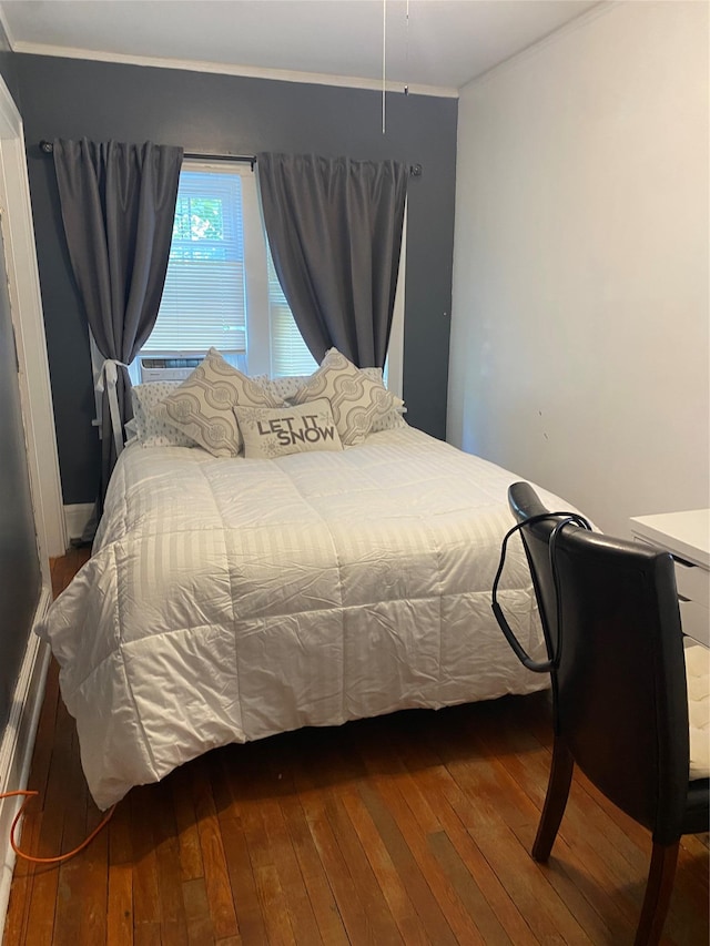 bedroom featuring hardwood / wood-style floors