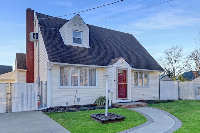 view of front of house with a front lawn