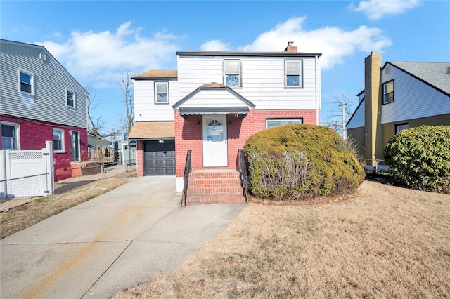 view of front facade with a front yard and a garage