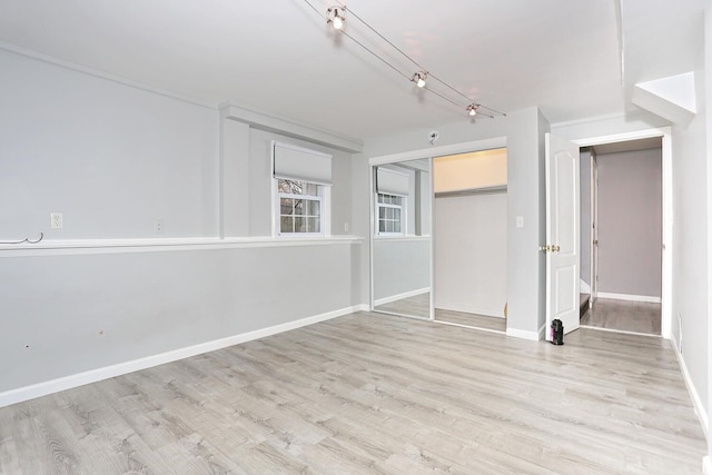 empty room featuring light wood-type flooring