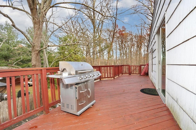 wooden terrace with area for grilling