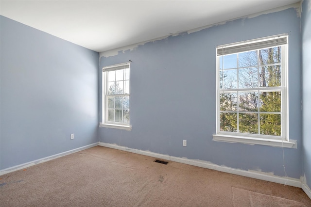 view of carpeted spare room