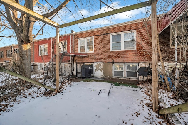 view of snow covered property