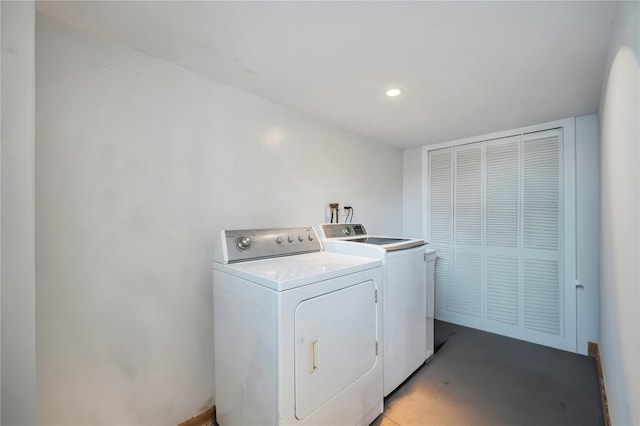 laundry area with washing machine and clothes dryer