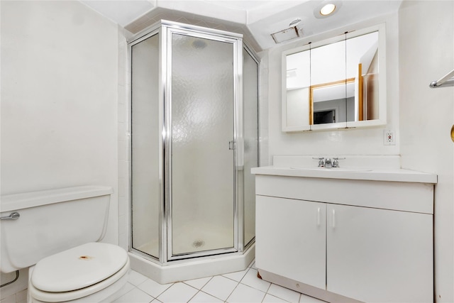 bathroom with toilet, an enclosed shower, tile patterned floors, and vanity