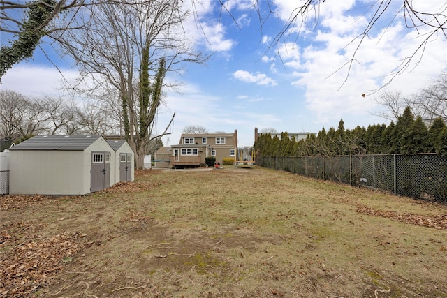 view of yard with a storage shed