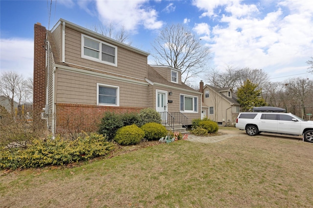 view of front of house featuring a front yard