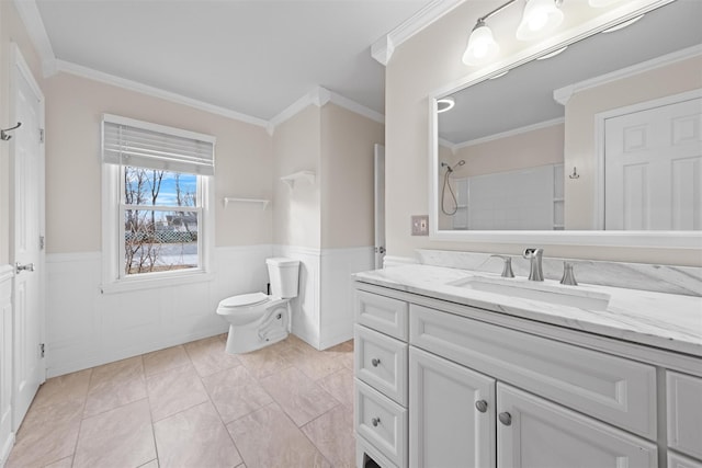 bathroom with ornamental molding, toilet, tile patterned floors, a shower, and vanity