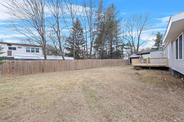 view of yard with a deck