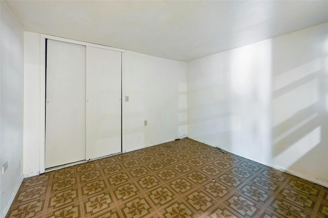 unfurnished bedroom featuring a closet