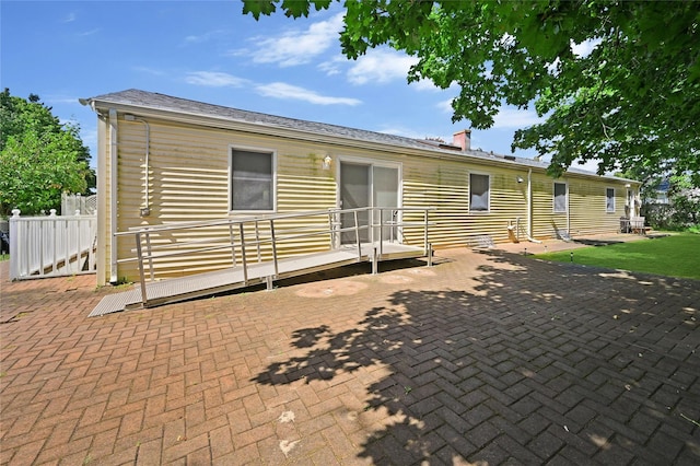 rear view of property with a patio