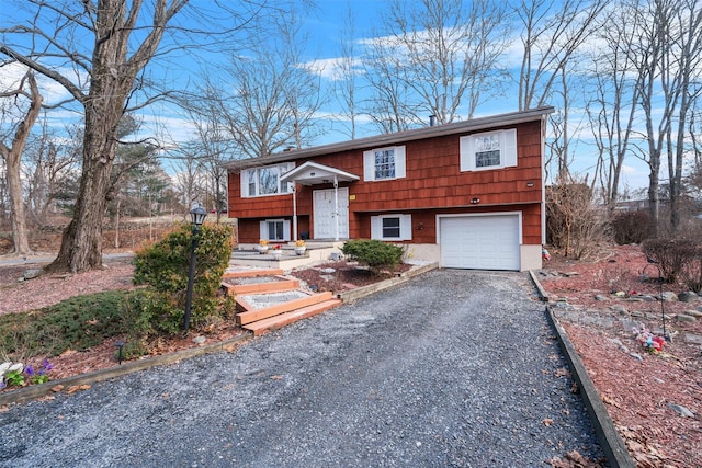 raised ranch featuring a garage