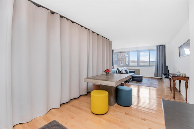 dining room with hardwood / wood-style floors