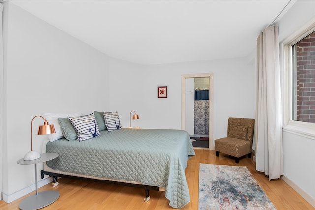 bedroom featuring light hardwood / wood-style floors