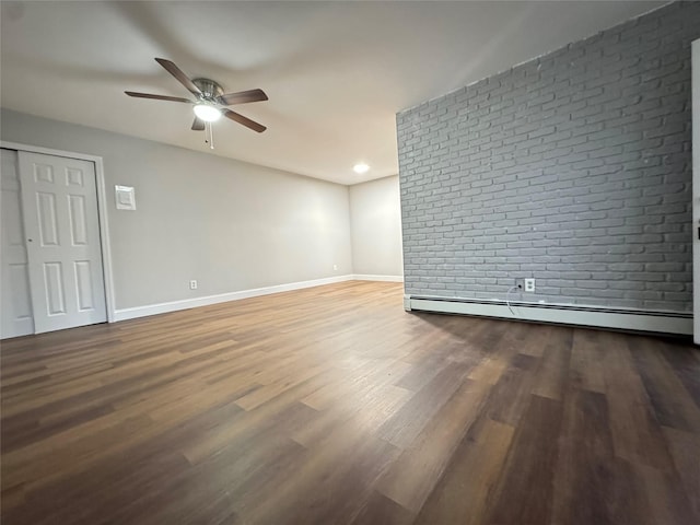 unfurnished room featuring wood-type flooring, a baseboard radiator, and ceiling fan