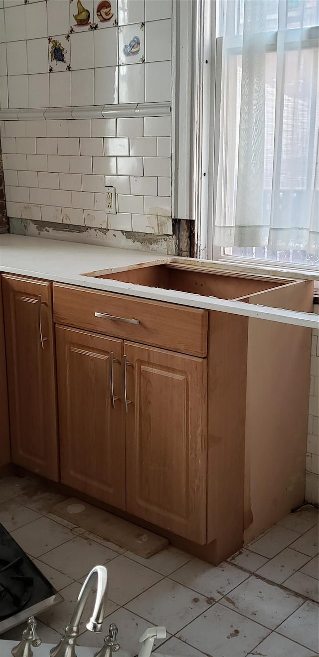 kitchen with tasteful backsplash