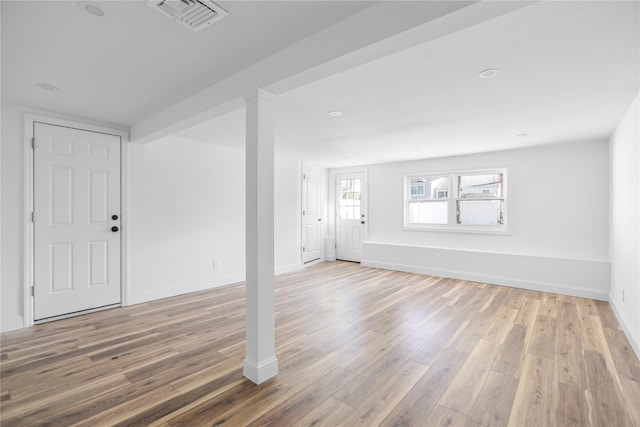 interior space with hardwood / wood-style floors