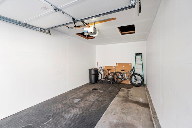 garage featuring a garage door opener