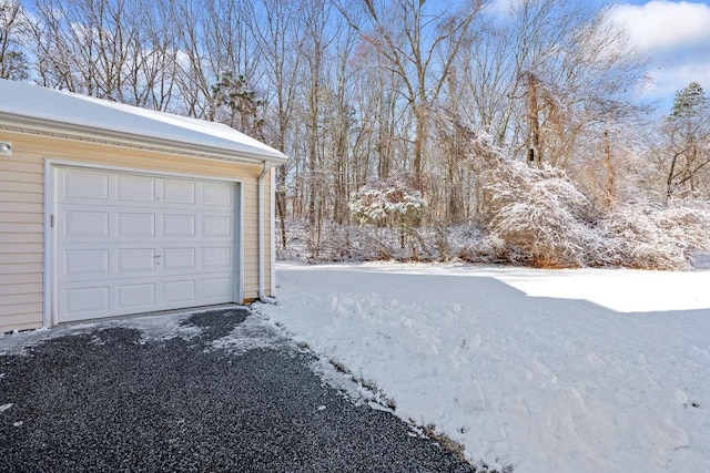 view of snow covered garage