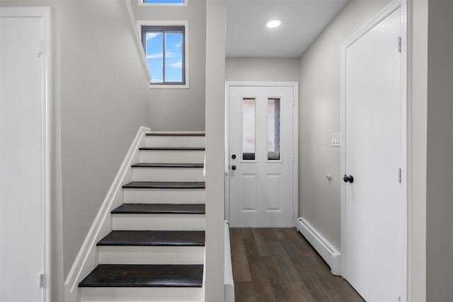 interior space with baseboard heating and hardwood / wood-style flooring