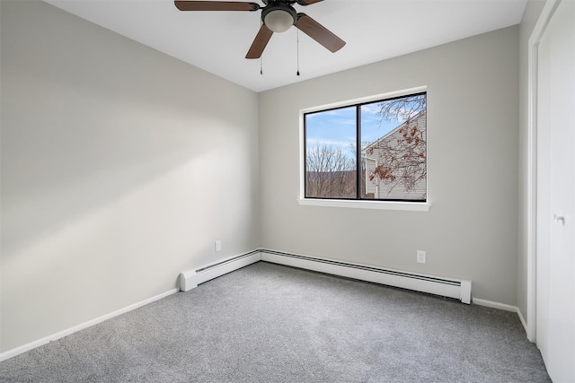 unfurnished room with carpet floors, ceiling fan, and a baseboard radiator