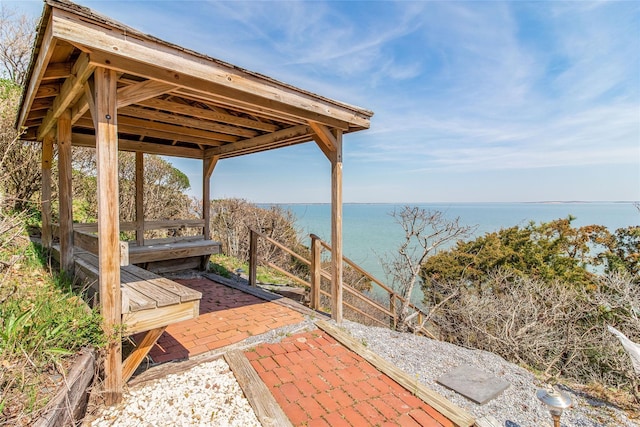 view of patio / terrace with a water view