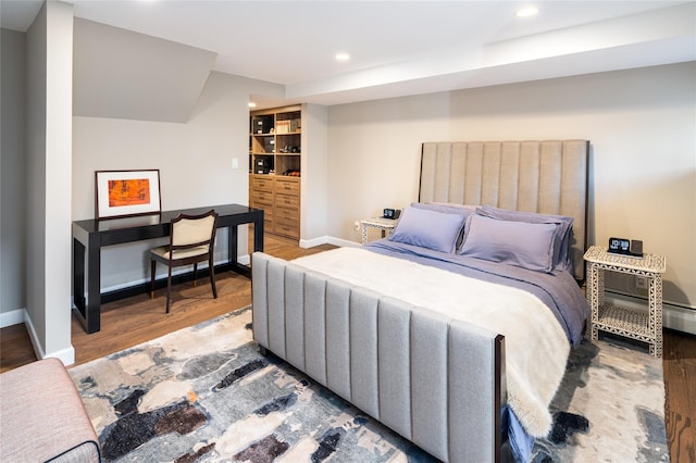 bedroom featuring hardwood / wood-style flooring