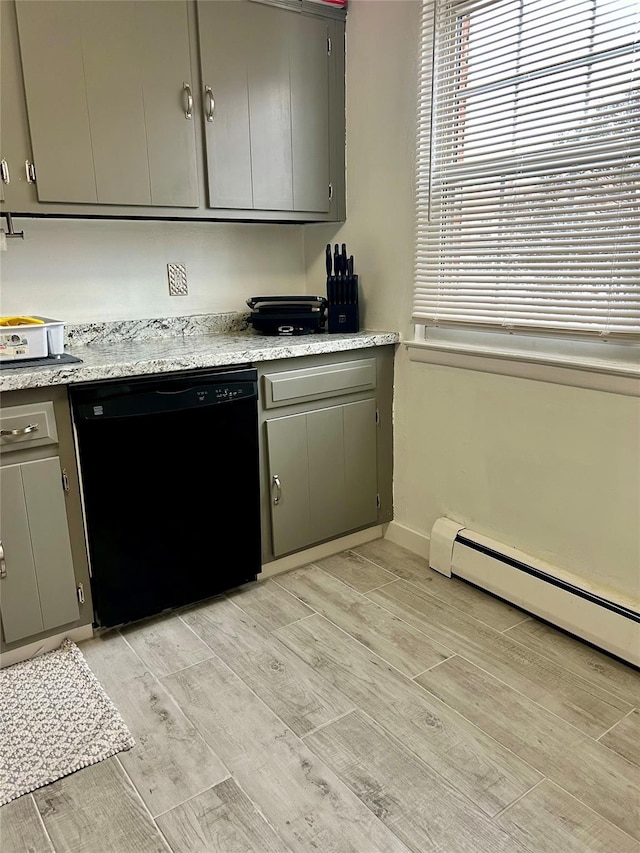 kitchen with gray cabinets, a baseboard radiator, and dishwasher