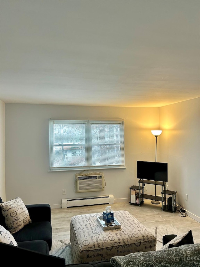 living room with a baseboard radiator, a wall mounted AC, and light wood-type flooring