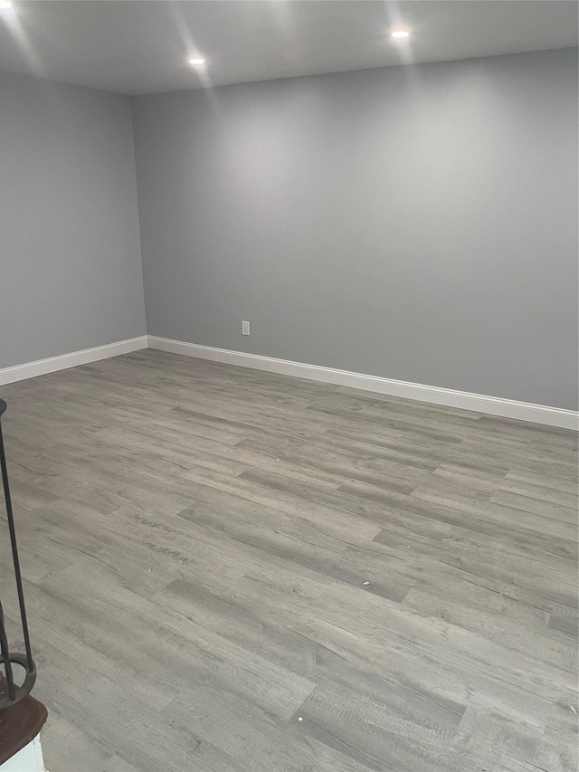 spare room with light wood-type flooring