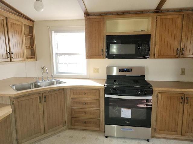 kitchen with sink and stainless steel gas range