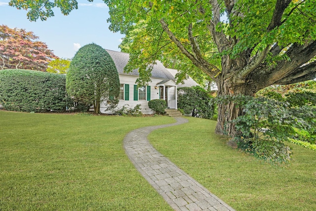 view of front of property with a front lawn