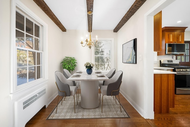 dining space with radiator heating unit, an inviting chandelier, and dark wood-type flooring