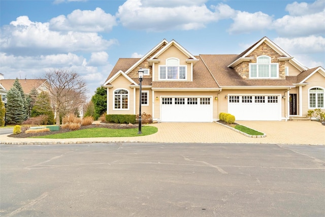 view of front of property featuring a garage