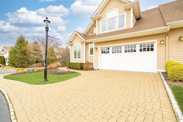 view of front of property featuring a garage