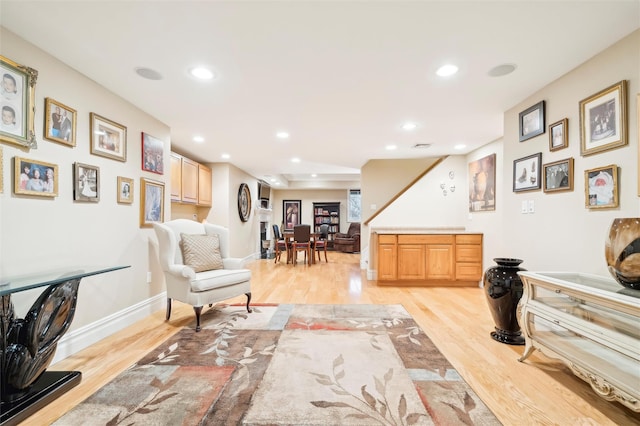 living room with light hardwood / wood-style floors