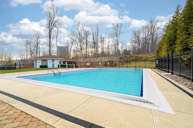 view of swimming pool with a patio area