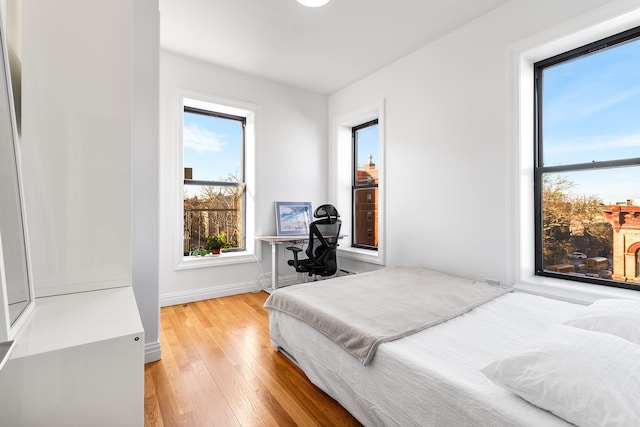 bedroom featuring hardwood / wood-style floors