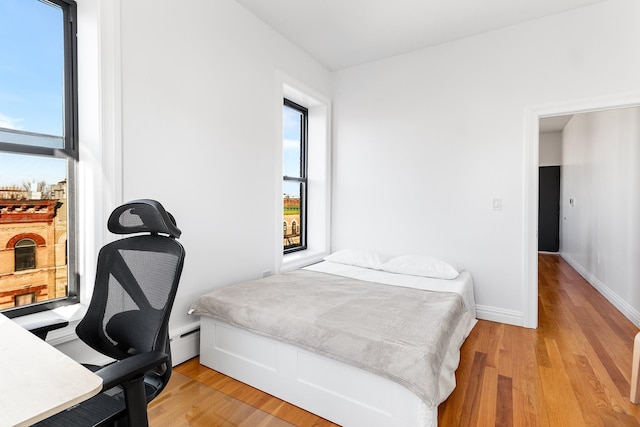 bedroom featuring light hardwood / wood-style floors